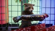 Rocket in The Guardians of the Galaxy Holiday Special holding Bucky's arm (Image via IMDb)